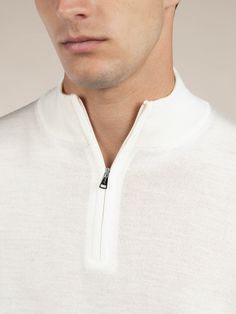 These Aurélien Zipper Sweater Ivory White for Men XXXL symbolize Mediterranean style and ultimate comfort. A combination of traditional details and a contemporary twist. This model is made in   100% Extrafine Merino Extrafine Merino. The  Sweater are made entirely by hand in Italy. For exclusive, luxurious and handmade Italian Sweater you've come to the right place at Aurélien! Casual White Merino Wool Tops, Classic Cream Merino Wool Tops, Elegant White Merino Wool Outerwear, Fitted Luxury Cream Sweater, Luxury Fitted Cream Sweater, Classic Cream Outerwear With Crew Neck, Fitted White Merino Wool Sweater, White Formal Sweater For Winter, Mockneck Sweater