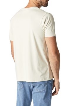 Sure to be a wardrobe favorite, this smooth and stretchy T-shirt features a classic fit and a naturally-dyed neutral hue that will look good all year 'round. 21" length Crewneck Short sleeves 48% organic cotton, 48% modal, 4% elastane Machine wash, dry flat Made in Turkey Basic Cream T-shirt For Everyday, Casual Soft-washed Cream Top, Casual Cream Soft-washed Top, Cream Short Sleeve Soft-washed T-shirt, Cream Soft-washed Short Sleeve T-shirt, Cream Organic Cotton Short Sleeve Top, Cream Short Sleeve Soft-washed Top, Cream Soft-washed Short Sleeve Top, Soft-washed Cotton Cream Tops