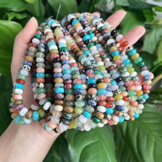 * Material: natural stone, dyed stone, synthetic stone     * Shape: smooth rondelle  * Size: about 5 x 8 mm  * Hole Size: about 1mm  * Quantity: 1 strand (about 15in) ✦ These cute rainbow rondelle beads are suitable for making jewelry such as necklaces and bracelets. It's a perfect handmade gift! ✦ The colors of each batch may differ from those shown in the picture, as they are randomly mixed rainbow beads. ★『 Picture is example only 』There will be slight different in color, shape and size...bec Healing Gemstone Beads Rondelle Bracelets, 8mm Rondelle Beads For Jewelry Making, Multicolor Natural Stones Round Beads, Multicolor Natural Oval Gemstone Beads, Multicolor Natural Oval Bead Gemstones, Multicolor Oval Natural Gemstone Beads, Multicolor Natural Stones Rondelle Beads, Multicolor 8mm Beads, Gems And Cabochons, Multicolor Polished Round Beads Gemstones