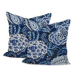 two pillows with blue and white designs on them