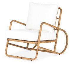 a white chair with a wooden frame and cushion on it's back legs, against a white background