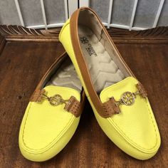 Upgrade Your Footwear Style With These Cushion Walk Women's Flat Loafers In A Vibrant Yellow Colorway. These Slip-On Shoes Feature A Comfortable Design With Buckle Embellishment And Faux Leather Upper Material. Perfect For Casual Occasions, These Loafers Also Add A Stylish Touch To Any Outfit With Their Brown Trim And Buckle Detail. Ideal For Those Who Value Both Comfort And Fashion, These Loafers Are A Must-Have For Any Fashion-Conscious Woman With A Us Shoe Size Of 6. Stylish, Comfortable, Nic Yellow Leather Slip-on Flats, Yellow Round Toe Slip-ons, Yellow Flats With Leather Sole And Round Toe, Yellow Round Toe Flats With Leather Sole, Yellow Slip-on Flats For Spring, Yellow Round Toe Slip-ons For Spring, Yellow Slip-on Flats With Rubber Sole, Yellow Slip-ons With Round Toe, Yellow Flats With Leather Sole