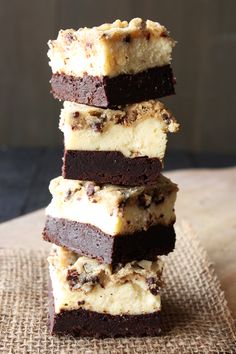 a stack of brownies sitting on top of a table