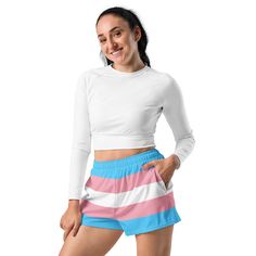 Add these cute transgender flag shorts to your trans pride wardrobe. These trans flag shorts are a great way to show off your transgender pride and gender identity. Not only are they super cool for pride events and festivals, they are functional athletic shorts made for swimming, running and other sporting activities and you'll won't want to be without them when heading to the beach or lounging by the pool. You'll also appreciate the mesh pockets large enough to hold your phone. DETAILSComfortable elastic waistband with a flat white drawstringDeep mesh side-pocketsWater-repellent microfiber fabricMoisture wickingBreathable & fast dryingUPF50+ protectionMATERIAL91% recycled polyester, 9% spandex (composition may vary by up to 3%)Model wears size MHeight 5.5 feet (165 cm), waist circumferenc Moisture-wicking Shorts For Cheerleading In Summer, Summer Athleisure Cheerleading Shorts, Sporty Cheerleading Shorts For Summer, Sporty Shorts For Summer Cheerleading, Moisture-wicking Athletic Shorts For Cheerleading In Summer, Summer Moisture-wicking Athletic Shorts For Cheerleading, Summer Cheerleading Athletic Shorts, White Athletic Shorts For Cheerleading In Summer, White Athletic Shorts For Summer Cheerleading