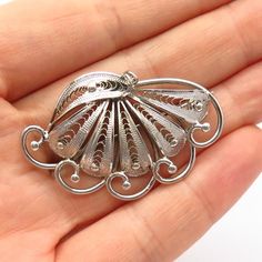 925 Sterling Silver Vintage Filigree Fan Design Pin BroochWeight: 7.2gWELCOME TO PAWN SHOPWe are an actual pawn shop and have been in business for over 25 years.Since 1990, our establishment has been serving a variety of clients by providing them with short term cash solutions and options of liquidity regarding their treasured heirlooms.Acknowledging that today′s customers are very sophisticated and are looking for a variety of investments, our acquisitions are hand-picked for our special client Luxury Engraved Brooches For Gift, Classic Silver Filigree Brooches, Classic Silver Brooches With Intricate Design, Ornate Filigree Pendant Brooch, Silver Filigree Brooch For Formal Occasions, Ornate Filigree Brooches For Collectors, Formal Silver Filigree Brooches, Vintage Filigree Pendant Brooch, Vintage Filigree Pendant Brooches