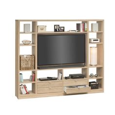 an entertainment center with bookshelves, baskets and a flat screen tv mounted on the wall