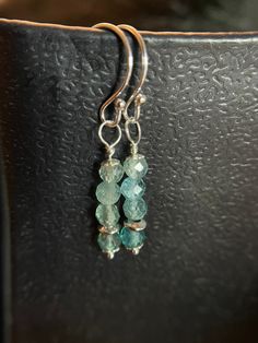 "Aqua jade sterling silver earrings: beautifully ombre coloured teal drop earrings. Ca. 1 1/4\". Although I bought the stones as jade, they look more like aquamarine or even grandidierite to me! They are teal green and translucent, not at all like any jade I have ever seen. A pop of colour for everyday wear that look good and elegant also on a night out." Turquoise Faceted Teardrop Earrings, Turquoise Faceted Drop Earrings, Turquoise Teardrop Faceted Earrings, Nickel-free Apatite Dangle Jewelry, Faceted Turquoise Teardrop Earrings, Elegant Turquoise Apatite Earrings, Sterling Silver Faceted Earrings For May Birthstone, Turquoise Apatite Gemstone Earrings, Blue Apatite Gemstone Earrings