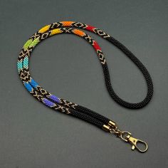 Add a splash of color to your day with this Rainbow Beaded Lanyard! Perfect as a teacher lanyard, key lanyard, custom badge holder, eyeglass chain, or beaded necklace. ### **Bright and Functional Design**   - Eye-catching rainbow pattern adds vibrant style to any outfit.   - Versatile use as a teacher lanyard, key lanyard, or badge holder.   - Ideal for daily wear, perfect for work, school, or events.   ### **Customizable for Your Needs**   - Detachable clasp allows it to transform into a chic b Beaded Lanyard Patterns, Lanyard Teacher, Id Lanyard, Beaded Lanyard, Vibrant Style, Necklace Colorful, Teacher Lanyard, Key Lanyard, Custom Badges