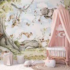 a baby's room with a mural and crib