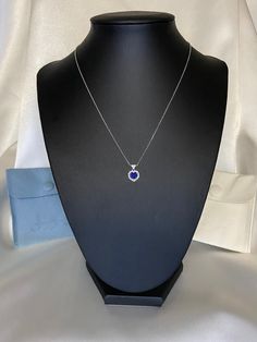 Dainty, feminine and stylish, our blue Cubic Zirconia Heart Necklace is the perfect everyday piece. Crafted from sterling silver, it features a blue heart-cut cubic zirconia stone, with smaller clear CZ stones surrounding it. This necklace is perfect for a gift for your girlfriend, mom, sister or bestfriend! 925 sterling silver  Length: 15.5 in + 2 in extender safe to be worn in water packaged in pouch/bag *also available in clear/white heart please message me Sapphire Heart Pendant Necklaces For Valentine's Day, Sapphire Heart Pendant Necklace For Valentine's Day, Blue Sapphire Heart Pendant Necklaces, Blue Sapphire Heart Pendant Necklace, Silver Sapphire Heart Pendant Necklace, Sapphire Sterling Silver Heart Pendant Necklace, Sapphire Heart Pendant Necklace In Sterling Silver, Heart Cut Sapphire Necklaces, Sapphire Heart Cut Necklace Fine Jewelry