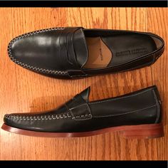 This Is A Sharp Looking Johnston & Murphy Loafer With A Black Leather Upper And Strap Across The Top Of The Shoe. There Is A Cushioned Insole With Good Arch Support. Nwot, Store Display Wear. Size 8.5m, Confirm Length Of 11.25 Inches. #Petfree #Smokefree Classic Black Slip-ons With Brogue Detailing, Classic Black Slip-ons With Stitched Sole, Black Boat Shoes With Leather Sole And Round Toe, Black Brogue Moccasins For Business Casual, Black Wingtip Loafers With Leather Footbed, Black Leather Plain Toe Boat Shoes, Black Leather Boat Shoes Plain Toe, Black Moccasins With Leather Footbed For Business Casual, Black Leather Footbed Moccasins For Business Casual