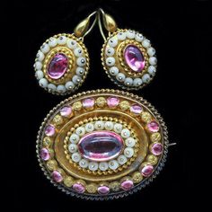 Brooch: top design is identical to that of earrings with a series of concentric rings in pink, white and gold. Antique Victorian earrings and brooch / pendant set in original, fitted box. 14k Gold, pink foil-backed gems and carved white coral. Traditional Yellow Gold Formal Brooches, Traditional Yellow Gold Brooches For Formal Occasions, Traditional Yellow Gold Collectible Brooch, Traditional Hallmarked Brooch For Formal Occasions, White Heirloom Brooch Jewelry, Heirloom White Brooch Jewelry, Traditional Gold Brooches For Anniversary, Traditional Gold Brooch For Anniversary, Traditional Yellow Gold Brooches As Gifts