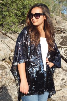 Made to order... Dance it out in this fab sparkly sequin top! Long kimono mid-length arms Open front with a flattering hi-lo silhouette One size fits all (up to 4X) Also available in a longer size 60s Witch, Sparkly Sequin Top, Sequin Kimono, Dance It Out, Mid Length Sleeves, Long Kimono, Caftan Dress, Print Swimsuit, Kimono Cardigan