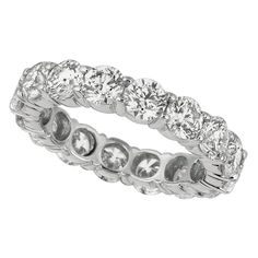 4.80 Carat Natural Diamond Eternity Ring G SI 18K White Gold 100% Natural Diamonds, Not Enhanced in any way Round Cut Diamond Eternity Band 4.80CT G-H SI 18K White Gold Prong style 3.80 grams 5 mm in width Size 7 16 stones MM40W.30 ALL OUR ITEMS ARE AVAILABLE TO BE ORDERED IN 14K WHITE, ROSE OR YELLOW GOLD UPON REQUEST. All Chains of Pendants and Necklaces Can be Requested in 16'' or 18'' Length. . This item is proudly handcrafted in the USA. Perfect gift on any occasion. This Item has passed hi Vintage Eternity Band, Diamond Eternity Band, Princess Cut Rings, Half Eternity Band, Eternity Band Ring, Eternity Ring Diamond, Princess Diamond, Eternity Band Diamond, Diamond Eternity