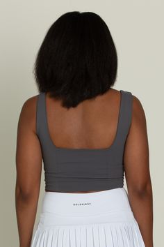 Charcoal Grey Corset Tank Top is so stunning and versatile. This corset-style tank has wide straps, a curved hem, and structured paneling on the bodice. Made for everyday, this tank is double lined for maximum support. Fitted Tank Top With Built-in Padding, Gray Athleisure Tank Top With Built-in Bra, Sleeveless Yoga Tank Top With Built-in Padding, Yoga Tank Top With Built-in Padding, Versatile Fitted Sleeveless Sports Bra, Stretch Sleeveless Tank Top With Built-in Padding, Fitted Tank Sports Bra With Built-in Bra, Stretch Tank Top With Built-in Padding, Fitted Tank Sports Bra With Built-in Padding