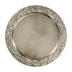 a silver plate with an intricate design on it