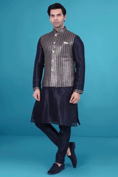 This kurta vest exudes sophistication with its understated sequin design. Perfect for a formal event or a special occasion, it adds a touch of luxury to any outfit. Elevate your style with this exclusive piece from our collection. Elegant Kurta With Zari Work For Fall, Fitted Nehru Jacket For Fall Party, Elegant Sleeveless Party Kurta, Elegant Sleeveless Kurta For Transitional Season, Festive Sleeveless Party Kurta, Festive Nehru Jacket For Party With Straight Kurta, Elegant Nehru Jacket For Party, Festive Nehru Jacket For Party, Elegant Sleeveless Designer Kurta