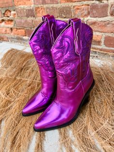 Set your style apart with these purple glam Sergio metallic boots! Tailored with pull tabs + black sole and heel. Who said you can't have fun in the wild west? Now you can, with these statement-making boots! 3.5 inch heel Western Snip Toe Moto Boots For Party, Western Style Snip Toe Moto Boots For Party, Western-style Party Moto Boots With Snip Toe, Party Western Moto Boots With Snip Toe, Purple Platform Boots For Fall, Purple Pointed Toe Winter Boots, Western Style Pointed Toe Moto Boots For Party, Purple Ankle Boots For Party, Western Moto Boots With Pointed Toe For Party