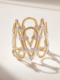 The intricate and sculptural forms of Nikos Koulis' 'Feelings' designs reflect the complexity of human emotions – the collection even won the coveted Couture Design Award when it first launched in 2019. This bracelet is crafted using an 18-karat gold snake chain that's arranged in teardrop-shaped cutouts and encrusted with 7.22-carats of shimmering diamonds in white gold settings. Nikos Koulis, White Gold Diamond Bracelet, Gold Diamond Bracelet, Couture Design, The Bling Ring, Gold Snake Chain, Bracelets Gold Diamond, Gold Snake, Fine Jewelry Bracelets