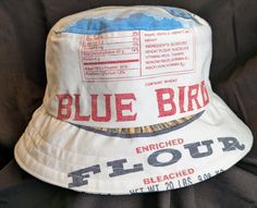 Reversible Bluebird Bucket Hat Upcycled Bluebird Flour bag. All hats come with a Bluebird on one side with a secondary option for the inside of the hat.   Hat size - Large approx. US Hat Size 7 1/4 - 7 3/8 Blue Reversible Bucket Hat, Blue Reversible Hat, One Size, Blue Reversible Brimmed Hat, Blue Reversible Hat One Size, Blue Reversible Hat, One Size Fits Most, Blue Reversible Hat One Size Fits Most, Baby Easter Gifts, Embroidered Bucket Hat, Crochet Birds