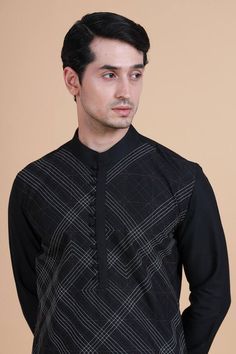 Black textured kurta with geometric pattern. Paired with cotton pant.
Component: 2
Pattern: Textured
Type Of Work: Geometric
Neckline: Mandarin collar
Sleeve Type: Full sleeves
Fabric: Silk, cotton
Color: Black
Other Details: 
Front potli button detailing
Occasion: Sangeet - Aza Fashions Raghavendra Rathore, Potli Button, Kurta For Men, Kurta Set For Men, Types Of Work, Luxury Sale, Black Textures, Fabric Silk, Kurta Set