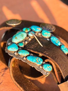 One of my favorite things to design, sterling silver and American turquoise "Ranger" buckles are inspired, artful creations. They look amazing with our vintage latigo belts or Wild West turquoise concho belts. This set is unique that it has a top, keeper, and A beautiful combination including natural Piolet Mountain and Royston turquoise. Our On the Range finish 3.5 to 4 inch size range. Please contact me for availability and pricing. I do my best to keep these in production, but often times hav Turquoise Belt Buckle, Concho Belts, Turquoise Stone Jewelry, Leather Goodies, Silver Smithing, Turquoise Belt, Cleanse Me, Concho Belt, American Turquoise