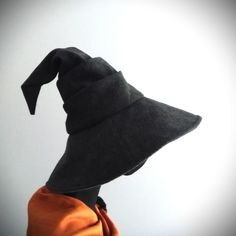 "This witch hat is an ideal for cosplay, Halloween and everyday wizardry.   The peak of hat is about 14\" tall , and brim is about 6\" wide. Sizes: round head 22\", 23\", 24\", 25\", 26\" and 28\".  If you need any other size, please contact me.    Handmade with durable polyester felt. Fully lined with silky charmeuse. Spot clean or hand wash when needed, line dry. Remove crinkles with steamer, no iron. Each hat will be made to order and ready to ship in 5 business days. Free domestic shipping by USPS 1st Class included.  Priority shipping available on request with additional charge." Halloween Costume Felt Hat With Brim, Brimmed Felt Hat For Halloween Costume, Curved Brim Felt Hat For Halloween Costume, Halloween Costume Felt Hat, Adjustable Brimmed Felt Hat For Halloween, Adjustable Costume Hats And Headpieces, Adjustable Wide Brim Felt Hat For Halloween, Halloween Wide Brim Top Hat, Halloween Adjustable Wide Brim Top Hat