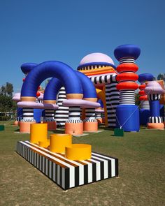 an inflatable park with giant blow up balloons