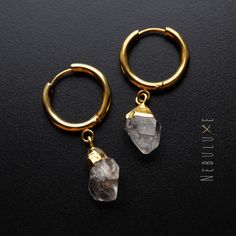 🤍 These Herkimer diamond hoop earrings are the perfect way to celebrate a special occasion or milestone. As the April birthstone and 60th-anniversary gemstone, Herkimer diamonds are believed to bring strength, clarity, and love. With their unique huggie hoop design, these earrings make a truly special gift for yourself or someone you love 🤍 ⭒ Material: Stainless Steel  ⭒ Finish: Silver * Gold * Rose Gold ⭒ Hoop Size:  thickness: 2.5mm / internal diameter: 10mm or 14mm ⭒ Gemstone size & plating Raw Crystal Earrings, Hoop Earrings Diamond, Herkimer Diamond Earrings, Hoop Design, Crystal Hoop Earrings, April Birthstone, Earrings Diamond, Uncut Diamond, Diamond Hoop Earrings