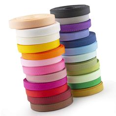 several colors of ribbon stacked on top of each other