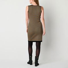 This Melonie T women�s jacket and sweater dress set is the ultimate polished one and done combination. Made from a houndstooth patterned knit, it includes a round neck sleeveless knee-length dress and a 3/4 sleeve jacket with a contrasting trim colored trim and vintage style buttons. Wear it with pointed-toe pumps.# Pieces In Set: 2Included: 1 Jacket(s)2nd Piece Description: Jacket2nd Piece Closure Type: Button2nd Piece Neckline: Round Neck2nd Piece Sleeve Style: Fitted Sleeve2nd Piece Sleeve L… Fitted Mini Dress For Fall Layering, Elegant Fall Dresses For Layering, Elegant Dresses For Fall Layering, Knee-length Mini Dress For Winter Workwear, Spring Workwear Knee-length Sweater Dress, Spring Knee-length Sweater Dress For Work, Elegant Mini Dress With Houndstooth Pattern For Winter, Winter Workwear Knee-length Mini Dress, Fitted Midi Dress With Houndstooth Pattern For Fall