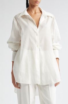 Wide-cut sleeves and a diaphanous cotton blend bring the Swedish label's signature sophistication to a wardrobe-essential button-up. 29 1/2" front length; 34" back length (size 6US/38EU) Front button closure Point collar Long sleeves with button cuffs Curved hem 50% organic cotton, 50% lyocell Dry clean or hand wash, line dry Imported Designer Clothing Summer Wardrobe Essentials, Sports Blazer, Made Clothing, Pant Shirt, Wide Sleeves, Comfortable Dress, Toddler Girl Outfits, Swimsuit Tops, Sweater Skirt