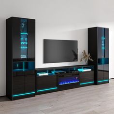 modern entertainment center with blue led lights and black cabinetry in the living room area