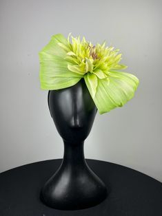 Lime green pinopok shaped and accented with a beautiful lime dahlia. Sits on a comfortable black headband. Lightweight and easy to wear. Ships in a high quality storage box. One of a kind.  Perfect for Kentucky Derby, Royal Ascot, church, weddings, just for fun. Elegant Green Hair Accessories For Kentucky Derby, Elegant Fitted Green Headband, Kentucky Derby Green Fascinator With Handmade Flowers, Green Spring Party Hair Accessories, Elegant Green Headband For Spring, Elegant Green Spring Headband, Fitted Green Headband For Spring, Green Summer Fascinator With Handmade Flowers, Green Fascinator With Handmade Flowers For Spring