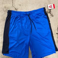 Size L Reebok Blue Shorts Sporty Blue Training Bottoms, Sporty Blue Bottoms For Jogging, Blue Athletic Shorts For Jogging, Sporty Moisture-wicking Blue Bottoms, Sporty Blue Moisture-wicking Bottoms, Blue Sportswear Athletic Shorts, Blue Sporty Athletic Shorts For Jogging, Blue Moisture-wicking Training Bottoms, Casual Blue Bottoms For Training