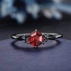 DETAILS: - Material : 925 Sterling Silver (Hypoallergenic, Nickel Free, Tarnish Resistant) 10/14/18k white/rose/yellow gold...), platinum - Main stone : 6x6mm hexagon natural garnet - Accent Stone : marquise 2*4 mm and 1.5 mm black spinel - Stone Cut : Hexagon - Carat Weight: 1ct. (approx.) AFTER-SALE SERVICE : 30 days money-back guarantee and for any reason, you are not satisfied with your purchase, please contact me and I will quickly handle your request within 24 hours. ACCEPT CUSTOM SERVICE: Red Gemstone Jewelry, Spinel Stone, Promise Rings Vintage, January Birthstone, Rose Yellow, Black Spinel, Stone Cuts, Ring Vintage, Gold Platinum