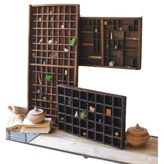 an assortment of wooden boxes and containers on a table