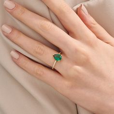 Adorn your finger with the stunning Diamond Pear Cut Emerald Ring, a symbol of timeless elegance and sophistication. This exquisite ring is designed for women who appreciate the beauty of nature's green gemstone, the emerald, and its rich symbolism. The ring can be made with yellow, rose, or white gold, please choose your size from the dropdown menu options above. 𝐑𝐢𝐧𝐠 𝐃𝐞𝐭𝐚𝐢𝐥𝐬: ❥ Solid gold, available in 10, 14 & 18 karats. ❥ Gold Color Options: White Gold, Yellow Gold, Rose Gold ❥ Ba Elegant Pear-shaped Yellow Gold Birthstone Ring, Fine Jewelry Solitaire Pear-shaped Ring, Fine Jewelry Pear-shaped For Proposal, Teardrop Solitaire Ring For Proposal, Classic Teardrop Gemstone Rings, Pear-shaped Solitaire Ring In Fine Jewelry, Elegant Pear-shaped Diamond Ring For Proposal, Elegant Pear-shaped Diamond Proposal Ring, Elegant Teardrop Ring For Proposal