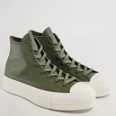 Converse Chuck Taylor All Star Hi High Top Utility Green / Egret / Silver Leather Women's Platform Sneakers / Boots A07131c Nwt Brand: Converse Model: Chuck Taylor All Star Lift Hi Style Code: A07131c Color: Utility / Egret / Silver Gender: Women's Size Guide: Us Women's 5.5 / Uk 3.5 / Eur 36 / Cm 22.5 Us Women's 6.5 / Uk 4.5 / Eur 37 / Cm 23.5 Us Women's 7.5 / Uk 5.5 / Eur 38 / Cm 24.5 Us Women's 8 / Uk 6 / Eur 39 / Cm 24.5 Us Women's 8.5 / Uk 6.5 / Eur 39.5 / Cm 25 Matte Meets Metallic Go For Khaki High-top Leather Sneakers, Khaki Leather Sneakers For Fall, Leather Khaki Sneakers For Fall, Green Leather High-top Sneakers Casual Style, Casual Leather Platform High-top Sneakers, Casual Green Leather High-top Sneakers, Leather Converse High-top Platform Sneakers, Casual Olive Lace-up Sneakers, Converse Leather High-top Sneakers With Laces