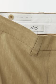 THE WIDE-LEG TURN-UP CHINOS - DARK BEIGE - COS Woman Silhouette, Dark Beige, Turn Up, Tailored Trousers, Mens Summer, Wardrobe Essentials, Design Details, Contemporary Style, Fashion Brand