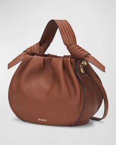 Bucket Bags, Rich Color Palette, Signature Hardware, Leather Bucket Bag, Leather Bucket, Flats Top, Open Top, Leather Flats, Toffee