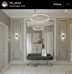 a room with white walls and marble flooring, chandelier hanging from the ceiling