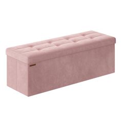 a large pink bench with buttons on the back and seat padding, in front of a white background