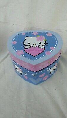 a hello kitty heart shaped box on a white background