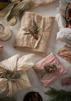 several wrapped presents sitting on top of a table