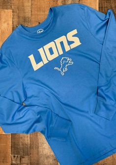 47 Detroit Lions Blue Pregame Super Rival Long Sleeve T Shirt - 48005629 Blue Graphic Print T-shirt For Football Season, Blue Jersey T-shirt For Football Season, Long Sleeve Cotton T-shirt With Team Name, Long Sleeve T-shirt With Team Logo For Streetwear, Long Sleeve T-shirt With Team Name For Fans, Blue Team Spirit T-shirt For Game Day, Long Sleeve Sports T-shirt With Team Logo, Long Sleeve Team Logo T-shirt For Streetwear, Long Sleeve Graphic Print T-shirt For Sports Fans