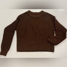 Brand New Casual Brown Acrylic Sweater, Casual Brown Knitted Sweater, Trendy Brown Acrylic Tops, Casual Brown Chunky Knit Top, Trendy Brown Cozy Fit Sweater, Casual Acrylic Cropped Sweater For Fall, Casual Ribbed Brown Sweater, Casual Brown Ribbed Sweater, Brown Knitted Acrylic Tops