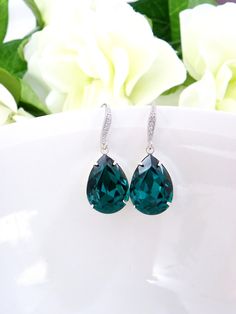 "I made those earrings using: - 18x13mm Swarovski Crystal pear shaped stones. - luster rhodium plated ear hook, tarnish resistant and hypoallergenic. - -earrings length 1 1/2\" inches Rhodium is the most expensive precious metal and is several times more expensive than gold. It has a bright luster and cool-white, blue-gray color. Has high hardness and resistance to corrosion. Rhodium-plated jewelry gives additional protective properties and due to its color and luster it enhances the appearance Turquoise Wedding Jewelry, Teal Stone, Dark Teal Green, Teal Earrings, Crystal Green, Turquoise Wedding, Earrings Bridesmaid, Swarovski Crystal Earrings, Exclusive Jewelry