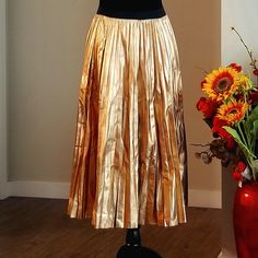 Nwt Authentic Red Valentino Women's Skirt,100% Genuine Lambskin Leather,Below The Knee Length,Beautiful!!!Pleated Lambskin Leather,Elastic Waistline,You Will Be Admired In This Skirt,Another Show Stopper!!!!,& Staple Piece For Your Closet,Gold Metallic & Black Colors,Sz 8,Originally $2400,Selling For $450,Price Firm!! Offer : ) Chic Gold Flared Skirt, Elegant Gold Skirt For Fall, Chic Gold Pleated Skirt, Gold Fitted Flared Skirt, Fitted Gold Flared Skirt, Gold Pleated Fitted Skirt, Gold Fitted Pleated Skirt, Fitted Gold Pleated Skirt, Elegant Pleated Gold Skirt