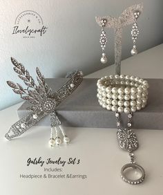 "Great Gatsby jewelry and 1920s jewelry (inspired on Daisy Buchanan's): 1920s headpiece, Gatsby pearl bracelet, Gatsby headpiece, feather headband, art deco earrings, pearl necklaces, Great Gatsby necklace, broochs, sequined shawl ... All Gatsby accessories to complete your Roaring 20s outfit or your flapper dress. Perfect for a 1920's party, vintage weddings, a vintage inspired bride (Art deco) or even Downton Abbey themed party. BRACELET: It is decorated with lots of sparkling rhinestones and 1920s Accessories Aesthetic, 20s Accessories Jewelry, 20s Jewelry Accessories, 1920 Jewelry Gatsby, The Great Gatsby Jewelry, Great Gatsby Earrings, Silver Gatsby Jewelry For Vintage Events, The Great Gatsby Prom Dresses, Gatsby Bracelet